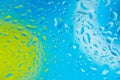Water droplets against a blue and green background Royalty Free Stock Photo