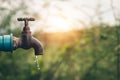 Water droplets on arid soil, Concept drought and crisis environment Royalty Free Stock Photo