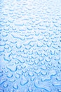 Water droplets blue background Royalty Free Stock Photo