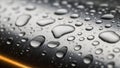 Water droplets on a brushed metal surface create a reflective Royalty Free Stock Photo