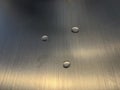Water Droplets On The Brushed Metal Surface Royalty Free Stock Photo