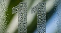 Water Droplets Forming Creative Number Eleven Design On Glass Surface Royalty Free Stock Photo
