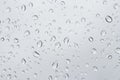 Water droplets on the glass in the rain. Water rain drop on window glasses Royalty Free Stock Photo