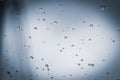 Water droplets on the glass in the rain. Water rain drop on window glasses Royalty Free Stock Photo