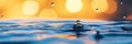 Water Droplets Sunset Reflection Water droplets falling on still water at sunset symbolizing tranquility purity reflection Royalty Free Stock Photo