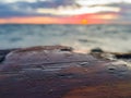 Water droplets on a wooden gunwale old sailing ship. Royalty Free Stock Photo