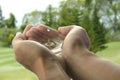 Water dropping on hand Royalty Free Stock Photo