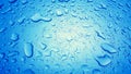 Water Drops background on the Blue glossy surface, Rain droplets Royalty Free Stock Photo