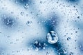 Water drops background on blue surface. Water droplets with refle Royalty Free Stock Photo