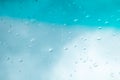 Water drops background. Water drops on glass window over blue sk Royalty Free Stock Photo