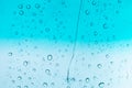 Water drops background. Water drops on glass window over blue sk Royalty Free Stock Photo