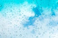 Water drops background. Water drops on glass window over blue sk Royalty Free Stock Photo