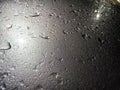 water drops on black. Abstract black background, texture, pattern, place for text, copy space Royalty Free Stock Photo