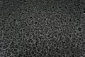 Water drops on a black background, closeup texture Royalty Free Stock Photo