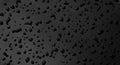 Water drops on black dark surface texture Royalty Free Stock Photo