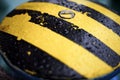 Water drops on black yellow mooring bar. Blur. Texture. Background Royalty Free Stock Photo