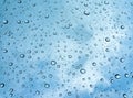 Water drops on blue background / Drops of rain on glass , rain drops on clear window / Blue Abstract Water Drops Background /