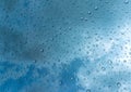 Water drops on blue background / Drops of rain on glass , rain drops on clear window / Blue Abstract Water Drops Background /