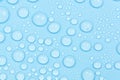 Water drops on blue background texture. Backdrop glass covered with drops of water. bubbles in water Royalty Free Stock Photo