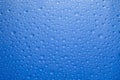 Water drops blue background. Water drops on glass background