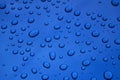 Water drops on blue car body threated with protective coating Royalty Free Stock Photo