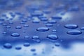 Water drops on blue car body threated with protective coating Royalty Free Stock Photo