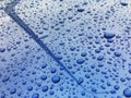 Water drops at blue car paint. Polishing and detailing cars