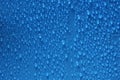 water drops blue color texture background close-up. Royalty Free Stock Photo