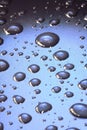 Water drops on blue glass background Royalty Free Stock Photo