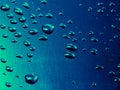 Water drops on blue steel background Royalty Free Stock Photo