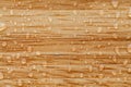 Water drops on a brown wooden surface Royalty Free Stock Photo