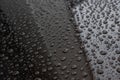 Water drops on car paint. Hydrophobic water effect on car body Royalty Free Stock Photo