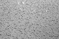 Water drops on car surface in black and white Royalty Free Stock Photo