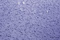 Water drops on car surface in blue tone Royalty Free Stock Photo