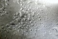 Water drops on a chrome metal background Royalty Free Stock Photo