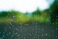 Water drops on a cobweb close-up on a blurred background. Beautiful abstract background. rainy cloudy cold weather