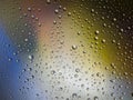 Water drops color background rain glass space rainbow. Royalty Free Stock Photo