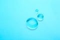 Water drops on color background, top view. Space for text Royalty Free Stock Photo