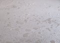 water droplets on a concrete floor, microcement waterproof surface Royalty Free Stock Photo