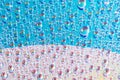 Water drops on dvd media, water drops on colorful background Royalty Free Stock Photo