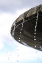 Water drops falling from ancient roman fountain Royalty Free Stock Photo