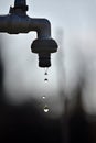 Water Drops Falling From A Tap In Garden, Dripping Tap Royalty Free Stock Photo