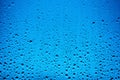 Water drops flow down on the glass in the rain Royalty Free Stock Photo