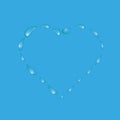 Water drops in the form of heart on a blue background Royalty Free Stock Photo