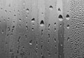 Water drops on the glass. Raindrops on the window. Close-up. Rainy day Royalty Free Stock Photo