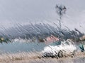 Water drops on glass. Blurry view through window with rain drops. Rainy cityscape from car Royalty Free Stock Photo