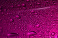 Water drops on glass. Purple beautiful abstract background. Macro Royalty Free Stock Photo