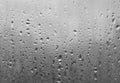 Water drops on the glass. Raindrops on the window. Close-up. Rainy day Royalty Free Stock Photo