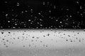 Water drops on glass texture abstract black dark background. Royalty Free Stock Photo