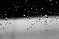 Water drops on glass texture abstract black dark background Royalty Free Stock Photo